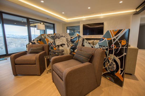 Contemporary seating area with pop art room divider