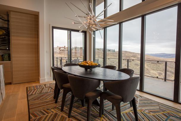 Dining room with starburst light and valley view