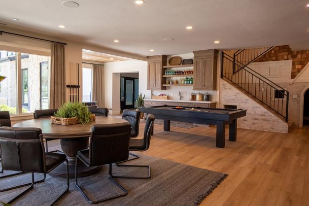 Game room with pool table and basement wet bar